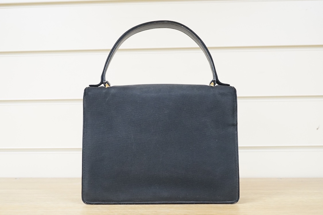 Two 1950's-60's Gucci handbags with one dust bag, largest 26cm wide